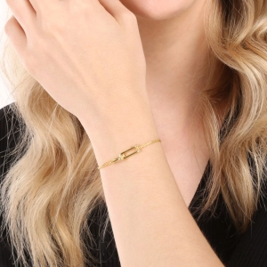 Pozlátený náramok s elegantným uzlom 63021